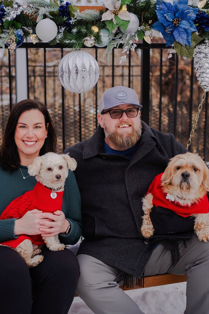 Jen, Curt, Cooper and Oscar in matching red sweaters on a holiday swing